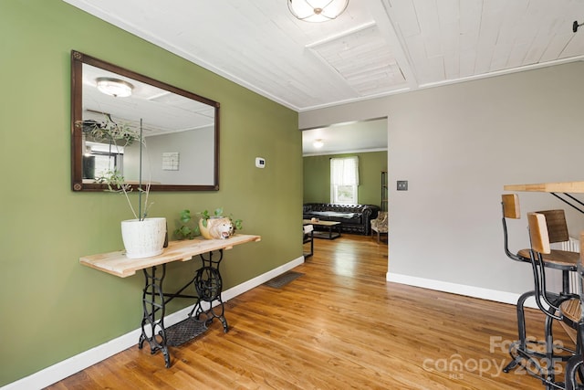 1271 Upper Brush Creek Rd, Fairview, NC 28730 - hall with wood finished floors, wood ceiling, and crown molding