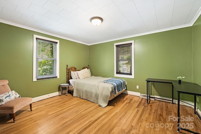 1271 Upper Brush Creek Rd, Fairview, NC 28730 - bedroom featuring ornamental molding and hardwood / wood-style flooring