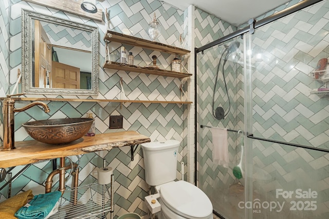 1271 Upper Brush Creek Rd, Fairview, NC 28730 - bathroom featuring a shower stall and tile walls