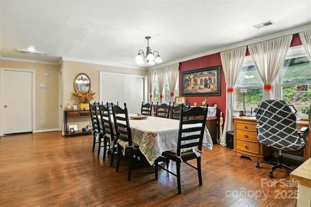 155 John Thomas Dr, Boone, NC 28607 - dining room featuring ornamental molding, healthy amount of natural light, a chandelier, and wood finished floors