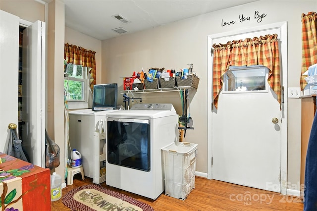 155 John Thomas Dr, Boone, NC 28607 - washroom with washing machine and clothes dryer and wood finished floors