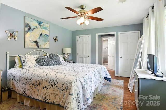 155 John Thomas Dr, Boone, NC 28607 - bedroom featuring dark wood-style floors, a ceiling fan, and ensuite bath