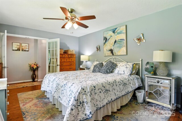 155 John Thomas Dr, Boone, NC 28607 - bedroom featuring wood finished floors and a ceiling fan