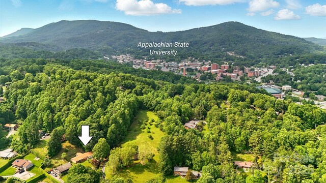 155 John Thomas Dr, Boone, NC 28607 - drone / aerial view of a mountain backdrop and a heavily wooded area