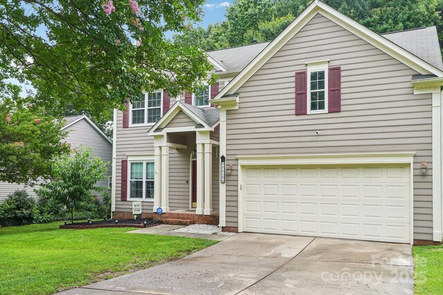 8618 Sam Dee Rd, Charlotte, NC 28215 - traditional home with concrete driveway, an attached garage, a front lawn, and a shingled roof