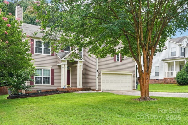 8618 Sam Dee Rd, Charlotte, NC 28215 - view of front of property with a garage, concrete driveway, a front lawn, and a chimney