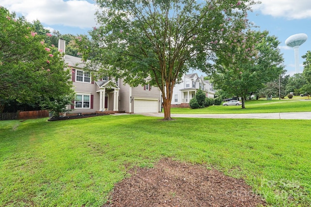 8618 Sam Dee Rd, Charlotte, NC 28215 - view of front of house featuring a garage, driveway, and a front yard