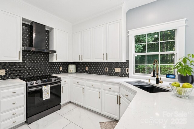 8618 Sam Dee Rd, Charlotte, NC 28215 - kitchen with wall chimney range hood, stainless steel electric stove, decorative backsplash, ornamental molding, and white cabinets