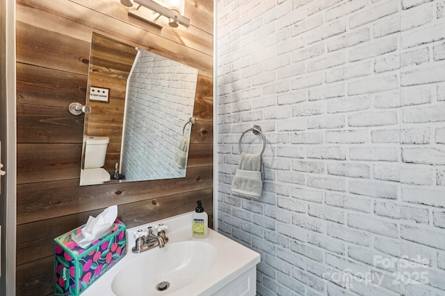 8618 Sam Dee Rd, Charlotte, NC 28215 - half bathroom featuring vanity and toilet
