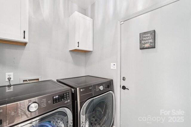 8618 Sam Dee Rd, Charlotte, NC 28215 - washroom featuring cabinet space and washing machine and clothes dryer