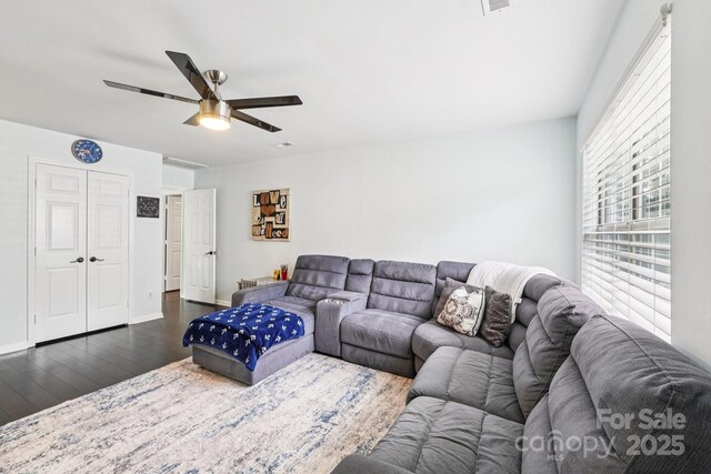 8618 Sam Dee Rd, Charlotte, NC 28215 - living area with dark wood-style flooring and ceiling fan