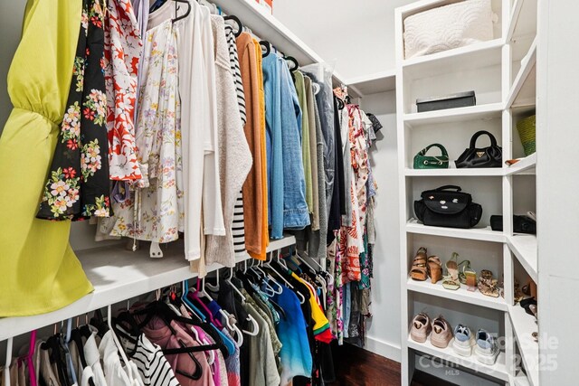 8618 Sam Dee Rd, Charlotte, NC 28215 - walk in closet featuring wood finished floors
