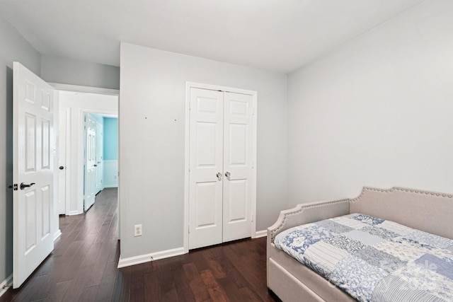 8618 Sam Dee Rd, Charlotte, NC 28215 - bedroom with dark wood-style flooring and a closet