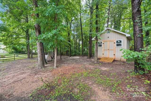 8618 Sam Dee Rd, Charlotte, NC 28215 - view of yard with a storage unit