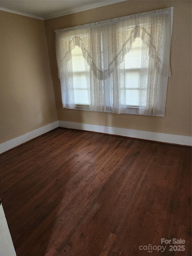 423 Tot Dellinger Rd, Cherryville, NC 28021 - empty room with crown molding and dark wood-type flooring