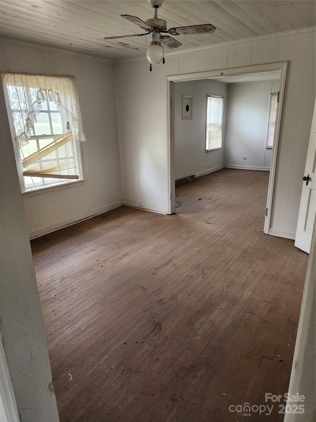 423 Tot Dellinger Rd, Cherryville, NC 28021 - spare room featuring hardwood / wood-style flooring, ceiling fan, wooden ceiling, and crown molding