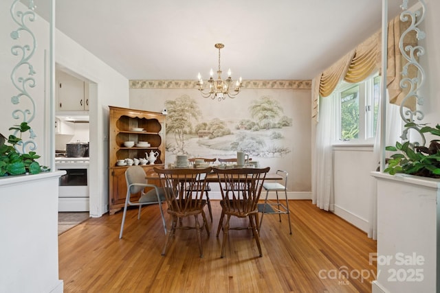 2500 Kendrick Dr, Charlotte, NC 28214 - dining area with a chandelier and light wood-style floors