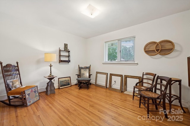 2500 Kendrick Dr, Charlotte, NC 28214 - living area featuring light wood-style floors and baseboards