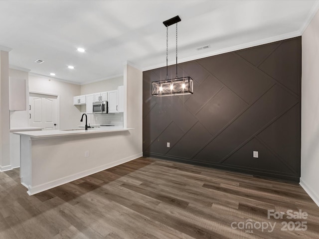 17136 Red Feather Dr, Charlotte, NC 28277 - unfurnished dining area with dark wood finished floors, recessed lighting, and crown molding