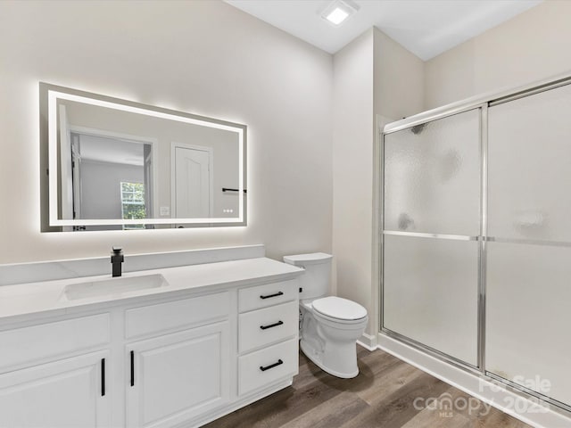 17136 Red Feather Dr, Charlotte, NC 28277 - bathroom featuring wood finished floors, vanity, and a shower stall