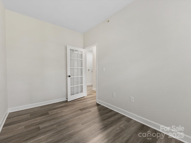 17136 Red Feather Dr, Charlotte, NC 28277 - spare room with baseboards and dark wood-style flooring