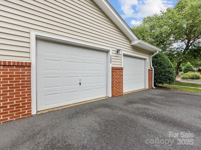 17136 Red Feather Dr, Charlotte, NC 28277 - garage with asphalt driveway