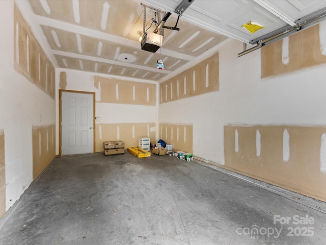 17136 Red Feather Dr, Charlotte, NC 28277 - garage featuring a garage door opener
