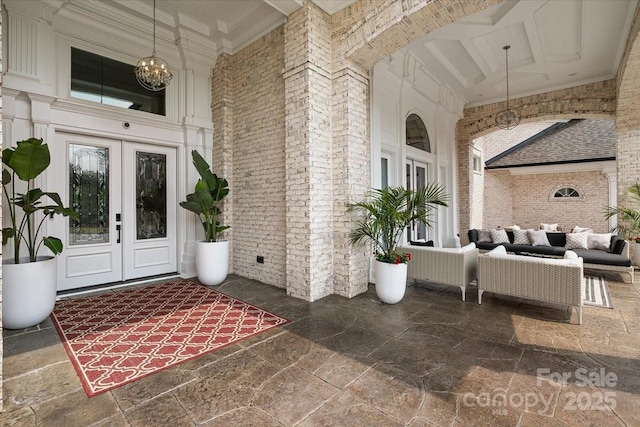 7068 Denison Rd, Summerfield, NC 27358 - view of exterior entry featuring french doors, covered porch, and outdoor lounge area