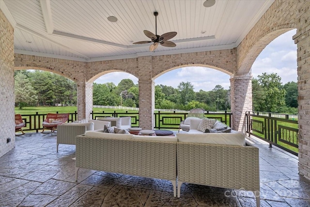 7068 Denison Rd, Summerfield, NC 27358 - view of patio / terrace with an outdoor living space, ceiling fan, and view of wooded area