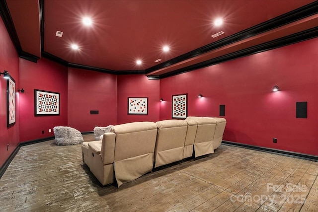 7068 Denison Rd, Summerfield, NC 27358 - cinema room featuring ornamental molding, wood-type flooring, and recessed lighting