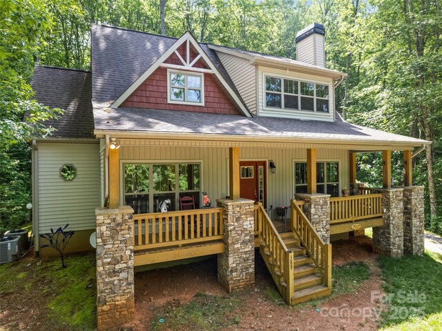 389 Manna Way, Sylva, NC 28779 - view of front facade with a porch, a chimney, and roof with shingles