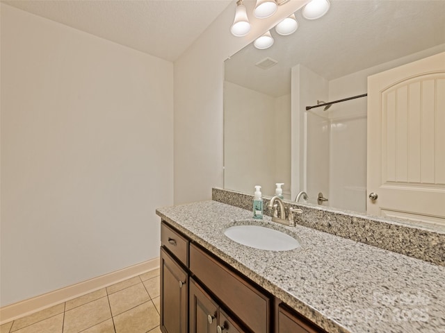 389 Manna Way, Sylva, NC 28779 - bathroom with vanity, tile patterned flooring, and a shower