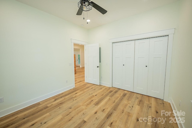 506 E Main St, Forest City, NC 28043 - unfurnished bedroom featuring light wood-style floors, a closet, recessed lighting, and ceiling fan