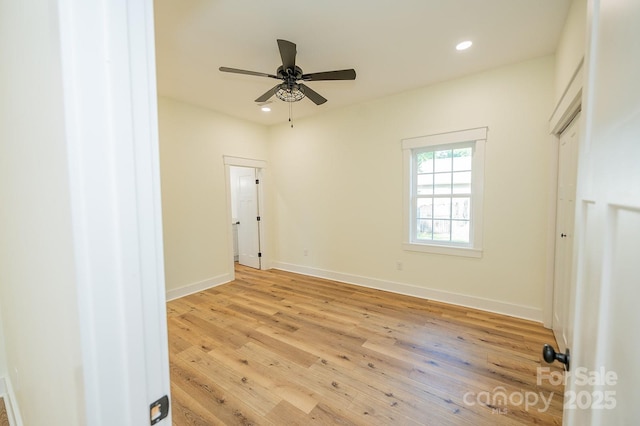 506 E Main St, Forest City, NC 28043 - unfurnished bedroom with light wood-type flooring, recessed lighting, and a ceiling fan
