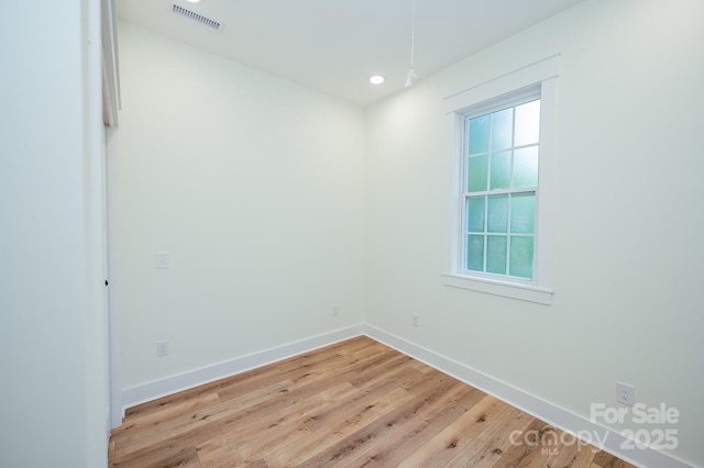 506 E Main St, Forest City, NC 28043 - unfurnished room featuring healthy amount of natural light, light wood finished floors, and recessed lighting