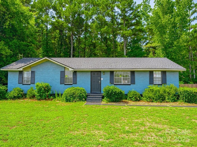 1035 Chesterfield Hwy, Cheraw, SC 29520 - ranch-style home featuring a front lawn, brick siding, and roof with shingles
