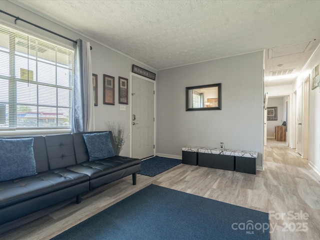 1035 Chesterfield Hwy, Cheraw, SC 29520 - unfurnished living room featuring wood finished floors and a textured ceiling