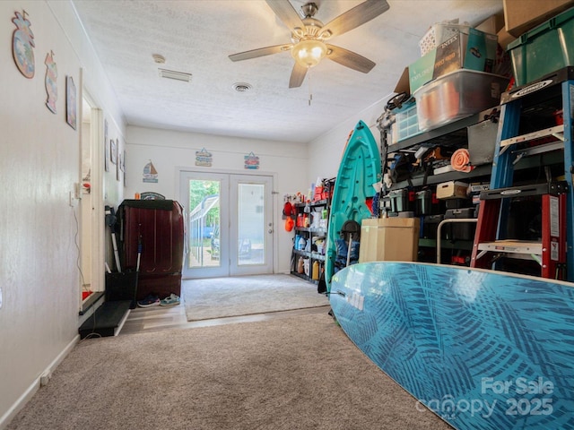 1035 Chesterfield Hwy, Cheraw, SC 29520 - bedroom featuring carpet flooring, access to exterior, ceiling fan, and french doors