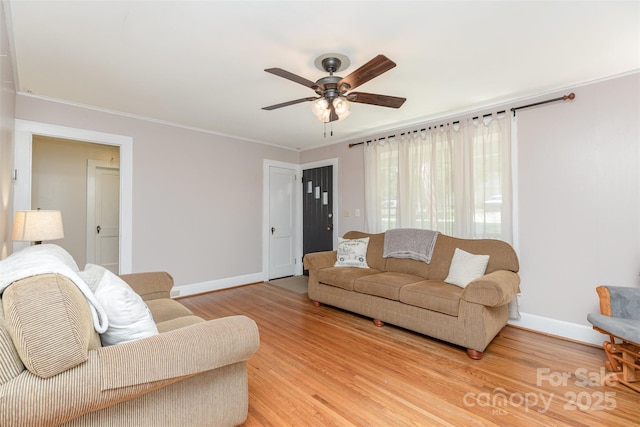 810 Maplewood Ave, Kannapolis, NC 28081 - living area featuring light wood-style flooring, a ceiling fan, and ornamental molding