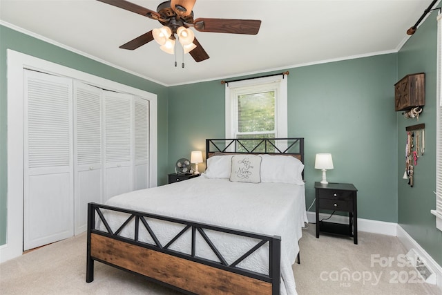 810 Maplewood Ave, Kannapolis, NC 28081 - bedroom with light colored carpet, crown molding, a closet, and ceiling fan