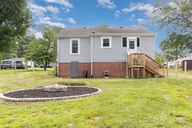 810 Maplewood Ave, Kannapolis, NC 28081 - rear view of property with a yard and an outdoor fire pit