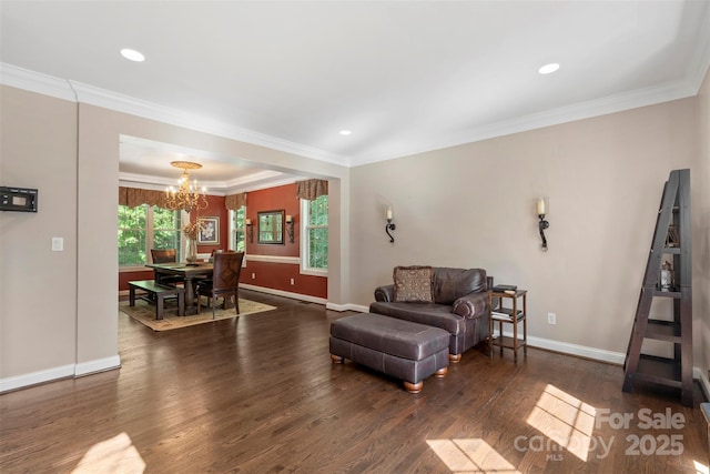 6006 Casswell Cir, Matthews, NC 28104 - living room with a chandelier, wood finished floors, ornamental molding, and recessed lighting