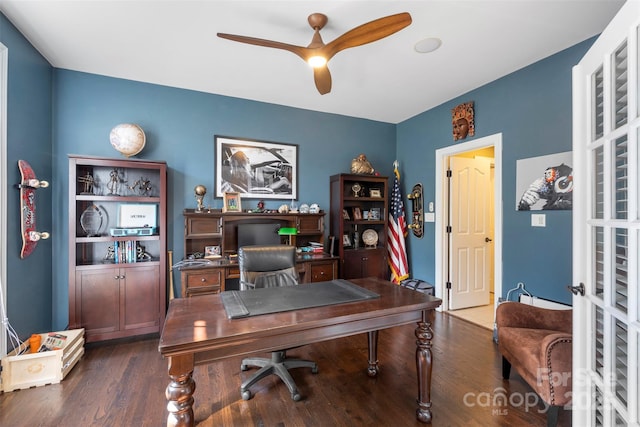 6006 Casswell Cir, Matthews, NC 28104 - home office featuring a ceiling fan and dark wood-style floors
