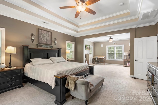 6006 Casswell Cir, Matthews, NC 28104 - bedroom with light carpet, a tray ceiling, crown molding, and a ceiling fan