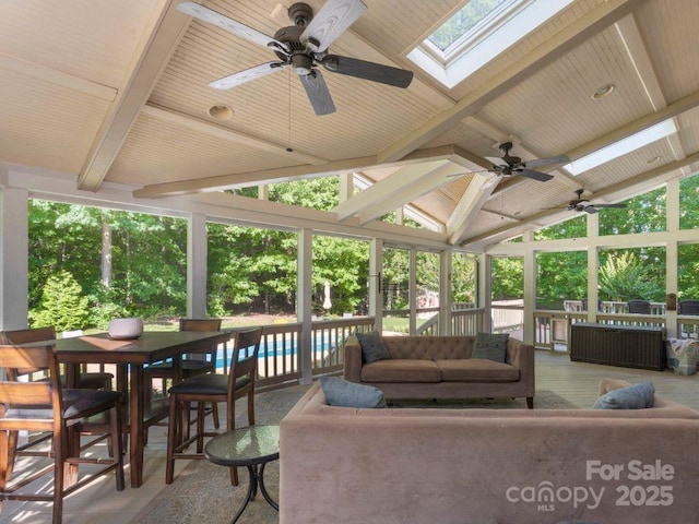 6006 Casswell Cir, Matthews, NC 28104 - sunroom featuring a ceiling fan, an outdoor living space, and a skylight