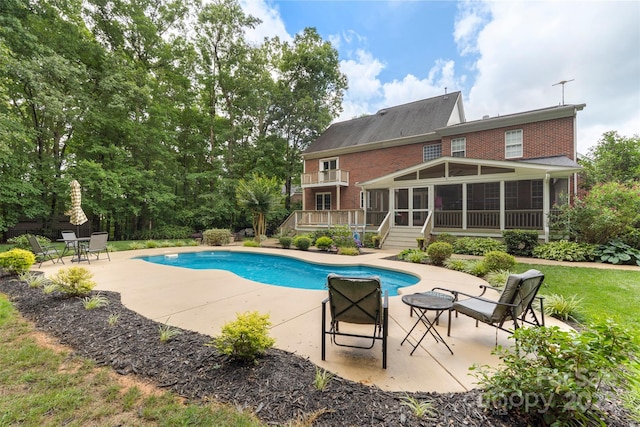 6006 Casswell Cir, Matthews, NC 28104 - swimming pool with a sunroom, a patio area, and stairs