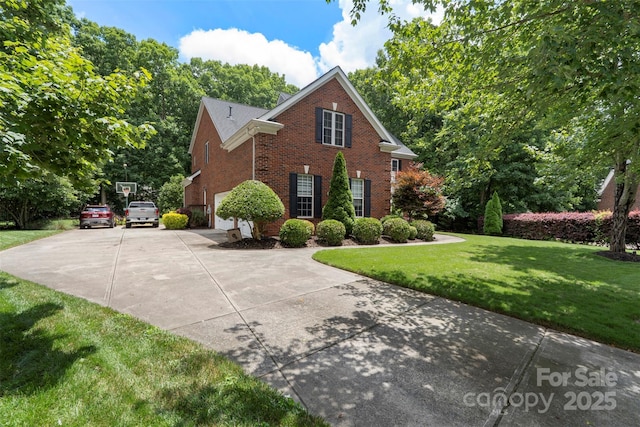 6006 Casswell Cir, Matthews, NC 28104 - view of side of property with brick siding, concrete driveway, a lawn, and a garage