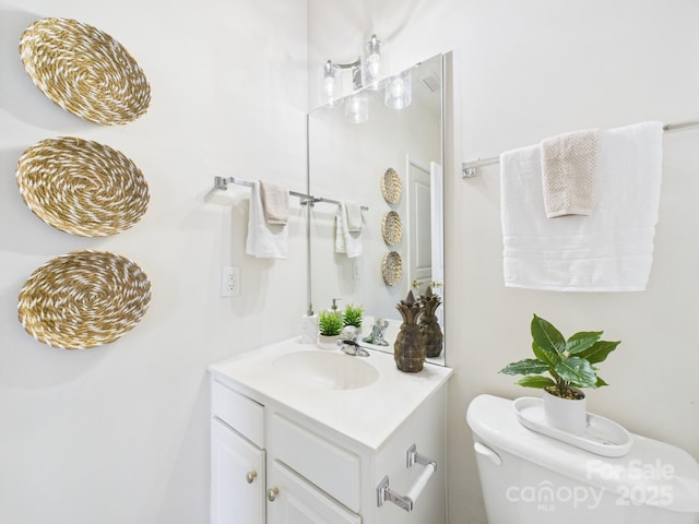 9030 Gander Dr, Charlotte, NC 28277 - half bathroom with vanity and toilet