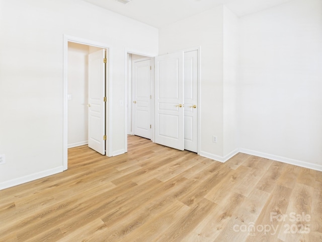 9030 Gander Dr, Charlotte, NC 28277 - unfurnished bedroom with light wood-type flooring and baseboards