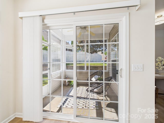 9030 Gander Dr, Charlotte, NC 28277 - doorway with baseboards and wood finished floors